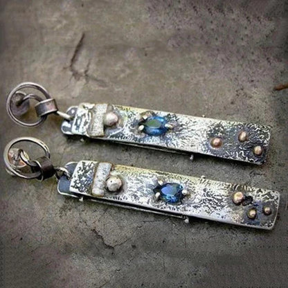 Handmade earrings made of blue stone